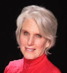 Photo of Ina Hillebrandt, Author, Writing Coach, Speaker. In red.
